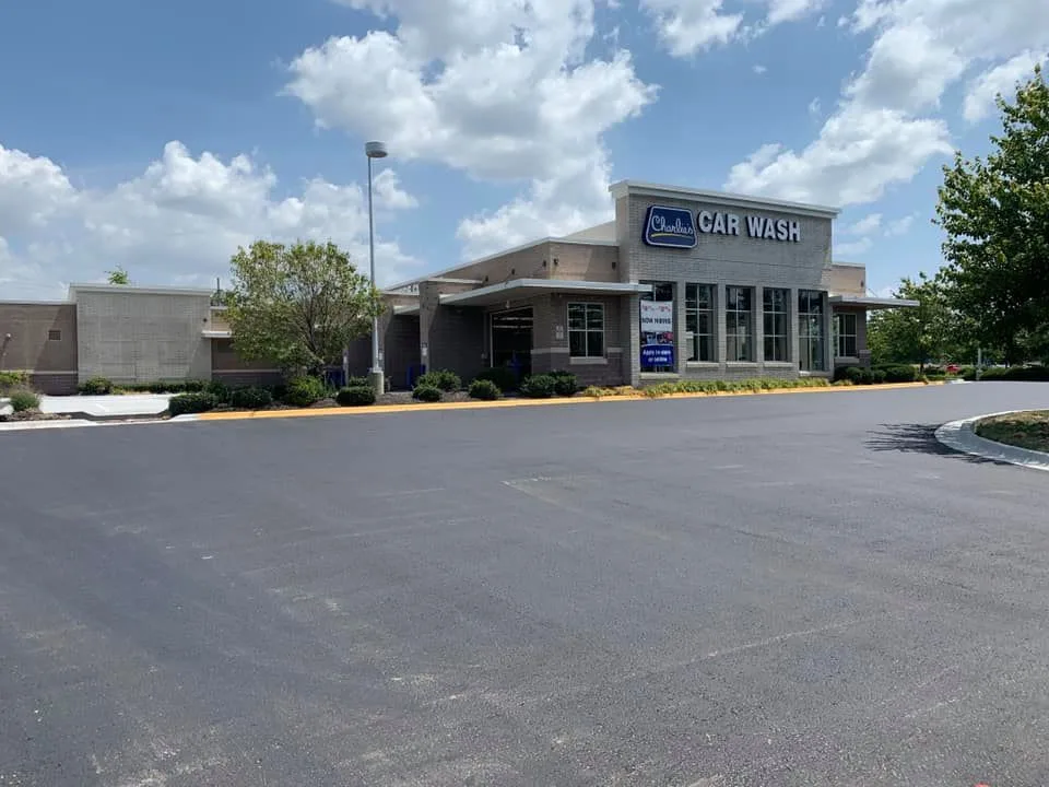 Completed commercial asphalt paving project at a Kansas City car wash