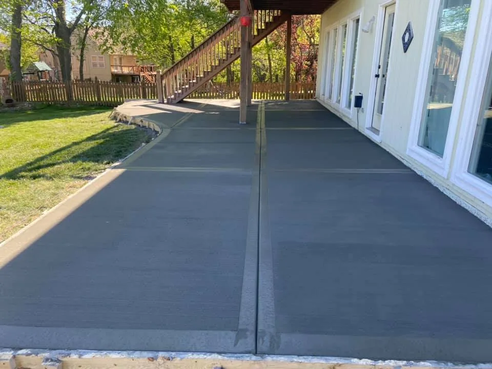 New concrete paving in Kansas City — broom-finished commercial pad pour